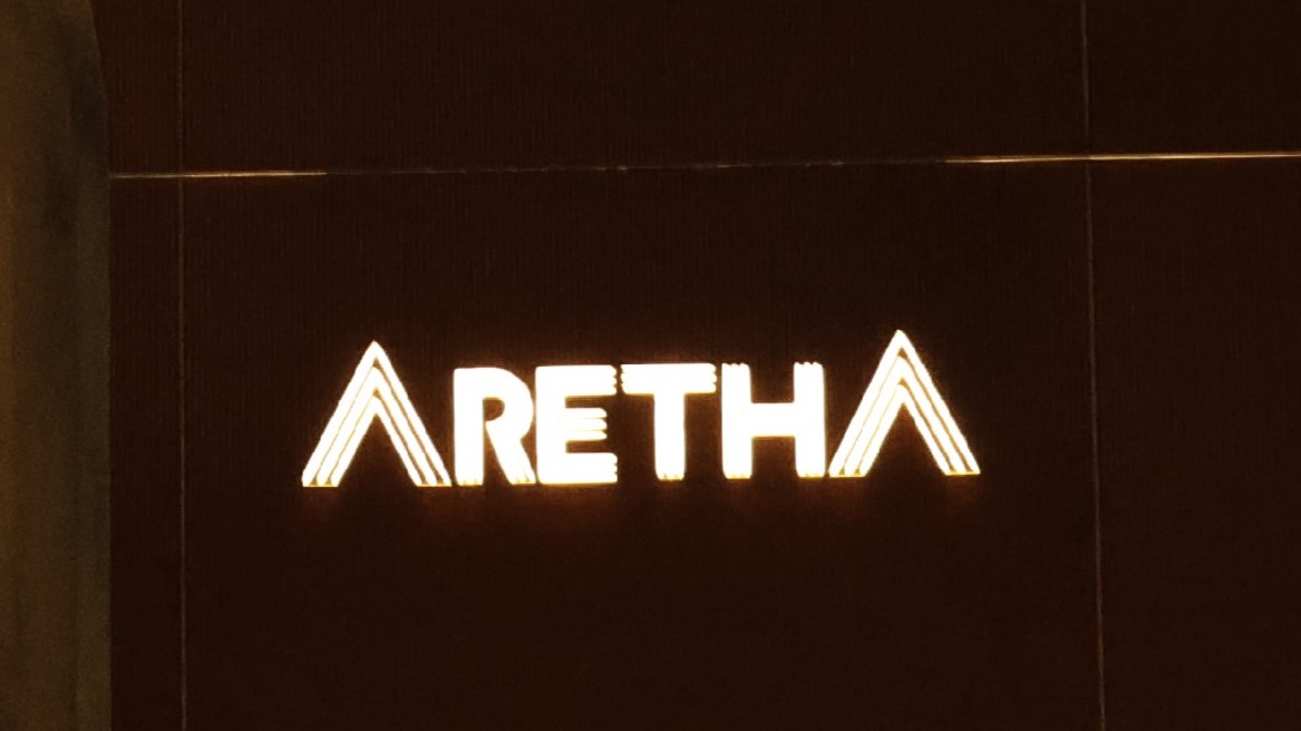 Aretha - Dubai Outlet Background