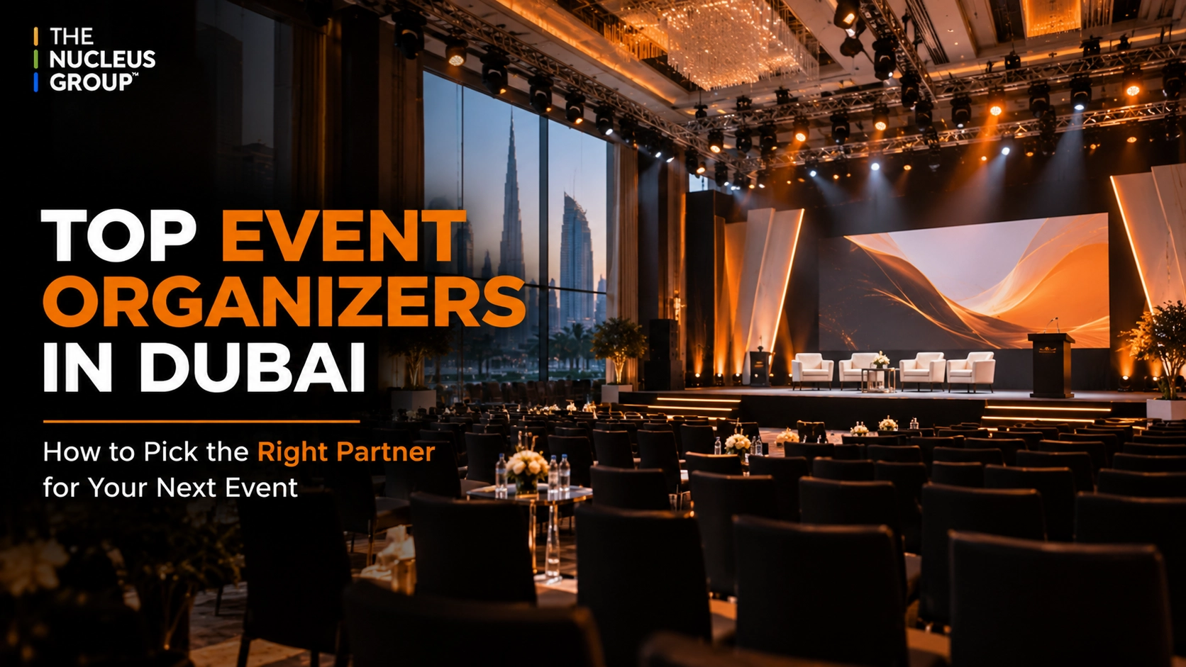 Event organizer Dubai, corporate event stage setup with lighting and branded backdrop